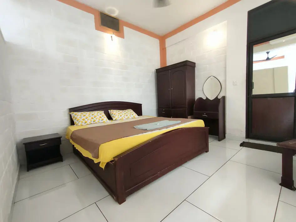 Super Deluxe Room with a separate sitting area